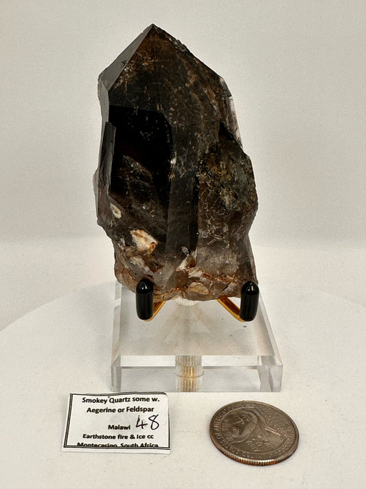 Smokey Quartz some with Aegerine or Feldspar